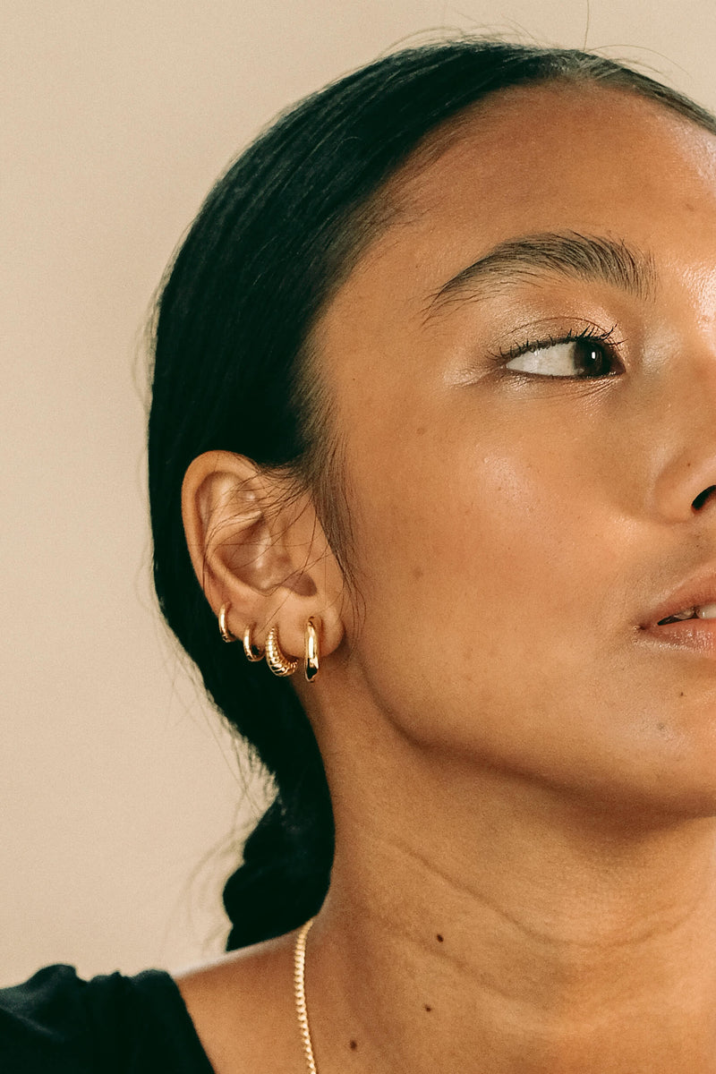 Ear hugging gold on sale hoops